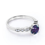 Four Claw 1.25 Carat Round Cut Lab Grown Alexandrite and Diamond Art Deco Solitaire Engagement Ring