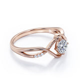 Modern Twisted 0.55 carat Round Moissanite and Diamond Infinity Engagement Ring in Rose Gold