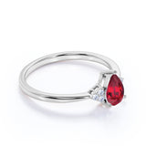 1.25 Carat Pear Shape Lab Ruby and Eight-Stone Diamond Engagement Ring in White Gold