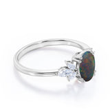 Butterfly style 1.25 Carat Oval Cut Natural Black Fiery Opal And Diamond Nature Inspired Engagement Ring In White Gold