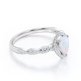 Twisted 1.45 Ct Pear Cut Lab Created Opal Engagement Ring