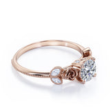 Sophisticated Roses 0.55 carat Round Moissanite Engagement Ring in Rose Gold