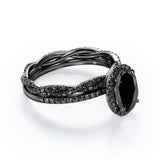 Four-Prong Halo 1.75 TCW Oval-Shaped Lab Created Black Diamond Pave Twisted Eternity Bridal Set in White Gold