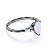 Affordable 1.35 Carat Tear Drop White Opal And Diamond  Seven Stone Engagement Ring In White Gold.