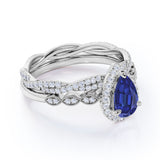 Antique Pave Set 2.25 Carat Pear Cut Sapphire and Diamond Halo Bridal Set with Infinity Band in White Gold
