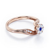 Floral Cloud Clustered 0.55 carat Round Blue Sapphire and Moissanite Distorted Engagement Ring in White Gold