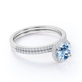Antique Style 1.75 Carat Round Brilliant Cut Aquamarine and Diamond Halo Bridal Ring set in White Gold