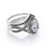 Milgrain Halo-Style 1.75 TCW Pear Cut Moissanite with Lab Created Black Diamond Pave Channel Wedding Ring Set in Black Gold