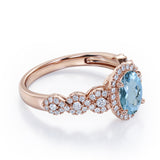 Twisted 1.45 Carat Oval Cut Aquamarine And Diamond Halo Engagement Ring In White Gold