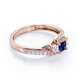 Trellis Three Stones 1 carat Princess Blue Sapphire and Moissanites Braided Engagement Ring in White Gold
