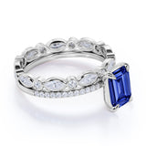 Unique Prong Set 2.25 Carat Emerald Cut Sapphire and Diamond Pave Bridal Set with Eternity Band in White Gold