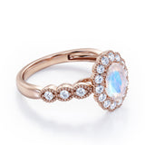Vintage Floral Halo 0.7 carat Oval and Round Moonstone and diamond Engagement Ring in Rose Gold