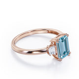 Eight Prongs 1.10 Carat Emerald Cut Aquamarine And Diamond Three Stone Engagement Ring In Rose Gold