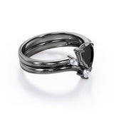 1 carat tear drop cut Black Diamond V shaped wedding ring set in white gold