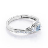 Trellis Three Stones 1 carat Princess Aquamarine and Moissanites Braided Engagement Ring in Rose Gold