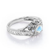 Seven Stone 1.05 Carat Round Cut Moonstone And Diamond Vintage Filigree Engagement Ring In White Gold