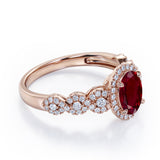 Twisted 1.45 Carat Oval Cut Lab Ruby And Diamond Halo Engagement Ring In White Gold