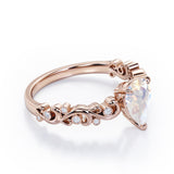 Vintage Style Scroll 0.5 carat Pear Moonstone and Diamond Engagement Ring in Rose Gold