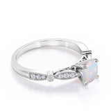 Vintage Inspired 1.25 Carat Round Cut White Fiery Opal And Diamond Four Prong Art Deco Style Engagement Ring In Rose Gold