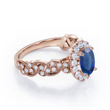 Milgrain Leaf 0.9 carat Oval Blue Sapphire and Diamonds Nature-Inspired Engagement Ring in White Gold