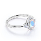 Vintage 1.50 Carat Oval Cut Blue Moonstone and Diamond Halo Engagement Ring in White Gold