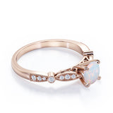 Vintage Inspired 1.25 Carat Round Cut White Fiery Opal And Diamond Four Prong Art Deco Style Engagement Ring In Rose Gold