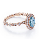 Vintage Halo 1.35 Carat Oval Cut Aquamarine And Diamond Art Deco Engagement Ring In Rose Gold