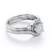 Pave-Prong Design 0.55 TCW Round Shape Moonstone and Moissanite Bridal Ring Set in Rose Gold