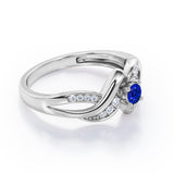 Distorted Unique Twisted Rope 0.6 carat Round Blue Sapphire and Moissanites Promise Ring in White Gold