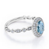 Vintage Halo 1.35 Carat Oval Cut Aquamarine And Diamond Art Deco Engagement Ring In Rose Gold