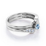 Mini Channel Design 0.5 TCW Round Cut Aquamarine and Moissanite Six-Prong Bridal Ring Set in White Gold