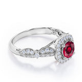 Antique Milgrain 1.35 Carat Round Cut Lab Ruby And Diamond Halo Engagement Ring In White Gold
