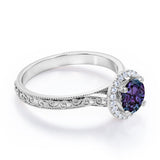 Art Deco 1.25 Carat Round Cut Lab Created Alexandrite And Diamond Halo Engagement Ring In White Gold