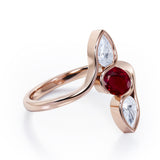 Distorted Line Three Stone 1 carat Oval and Pear Lab Ruby and moissanite Ring in Rose Gold