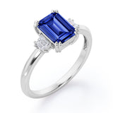 Eight Prongs 1.10 Carat Emerald Cut Sapphire And Diamond Three Stone Engagement Ring In Rose Gold