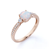 Three-Stone 1.10 Ct Round Cut Lab Created Opal Engagement Ring