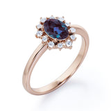 Hexagon Halo 1.20 Carat Oval Cut Lab Created Alexandrite And Diamond Bezel Set Four Prong Engagement Ring In White Gold