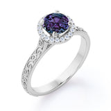 Art Deco 1.25 Carat Round Cut Lab Created Alexandrite And Diamond Halo Engagement Ring In White Gold