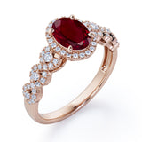 Twisted 1.45 Carat Oval Cut Lab Ruby And Diamond Halo Engagement Ring In White Gold