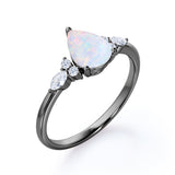 Affordable 1.35 Carat Tear Drop White Opal And Diamond  Seven Stone Engagement Ring In White Gold.