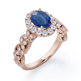 Milgrain Leaf 0.9 carat Oval Blue Sapphire and Diamonds Nature-Inspired Engagement Ring in White Gold