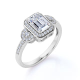 1.75 Carat Emerald Cut Moissanite and Diamond Halo Engagement Ring in White Gold