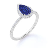 Elegant Pave 1.50 Carat Pear Shape Sapphire and Diamond Halo Engagement Ring in White Gold