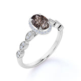 Antique Art Deco 1.50 Carat Oval Cut Transparent Black Brown Rutile Quartz and Diamond Halo Engagement Ring