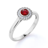 Plain Shank 1.25 Carat Round Cut Ruby and Diamond Bezel Halo Engagement Ring in White Gold