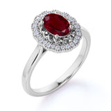 Plain Band 1.25 Carat Oval Cut Lab Ruby and Diamond Halo Engagement Ring in White Gold