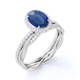 Antique Design 2.25 Carat Oval Cut Sapphire and Diamond Halo Wedding Set with Infinity Band in White Gold