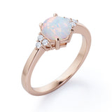 Seven Stone 1.25 Carat Round Cut Natural Opal And Diamond Tapered Engagement Ring In White Gold.