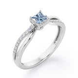 Twisted and Split Pinched Shank 0.65 carat Princess Aquamarine and Moissanites Elegant Engagement Ring in White Gold