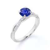 Infinity Style 1.25 Carat Round Cut Sapphire and Diamond Engagement Ring in White Gold